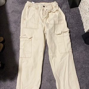 Cream pants with brown stitching from pacsun